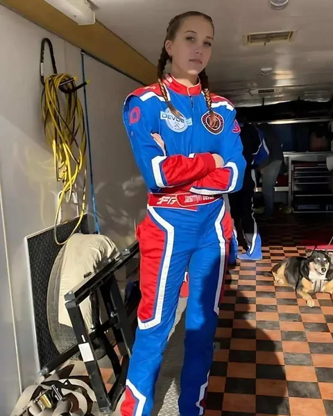 Jasmyn DeVoe in a custom red, white and blue race suit