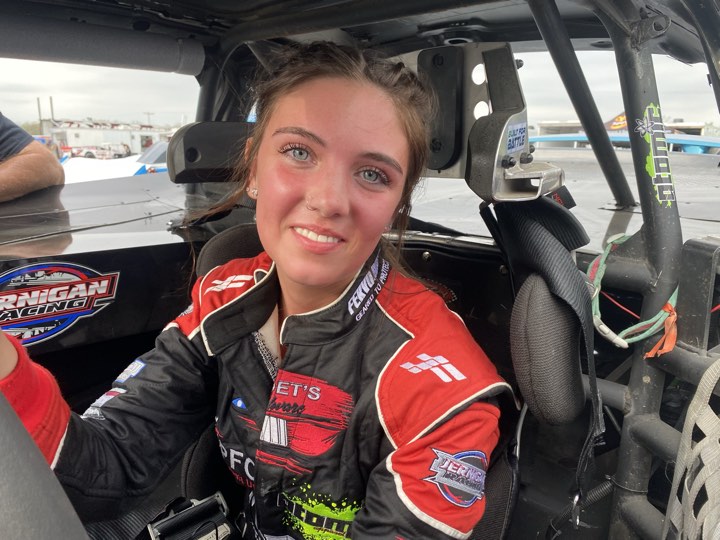 Female driver Kenedi Jernigan in a custom-fit women’s SFI-5 suit, built for protection and comfort