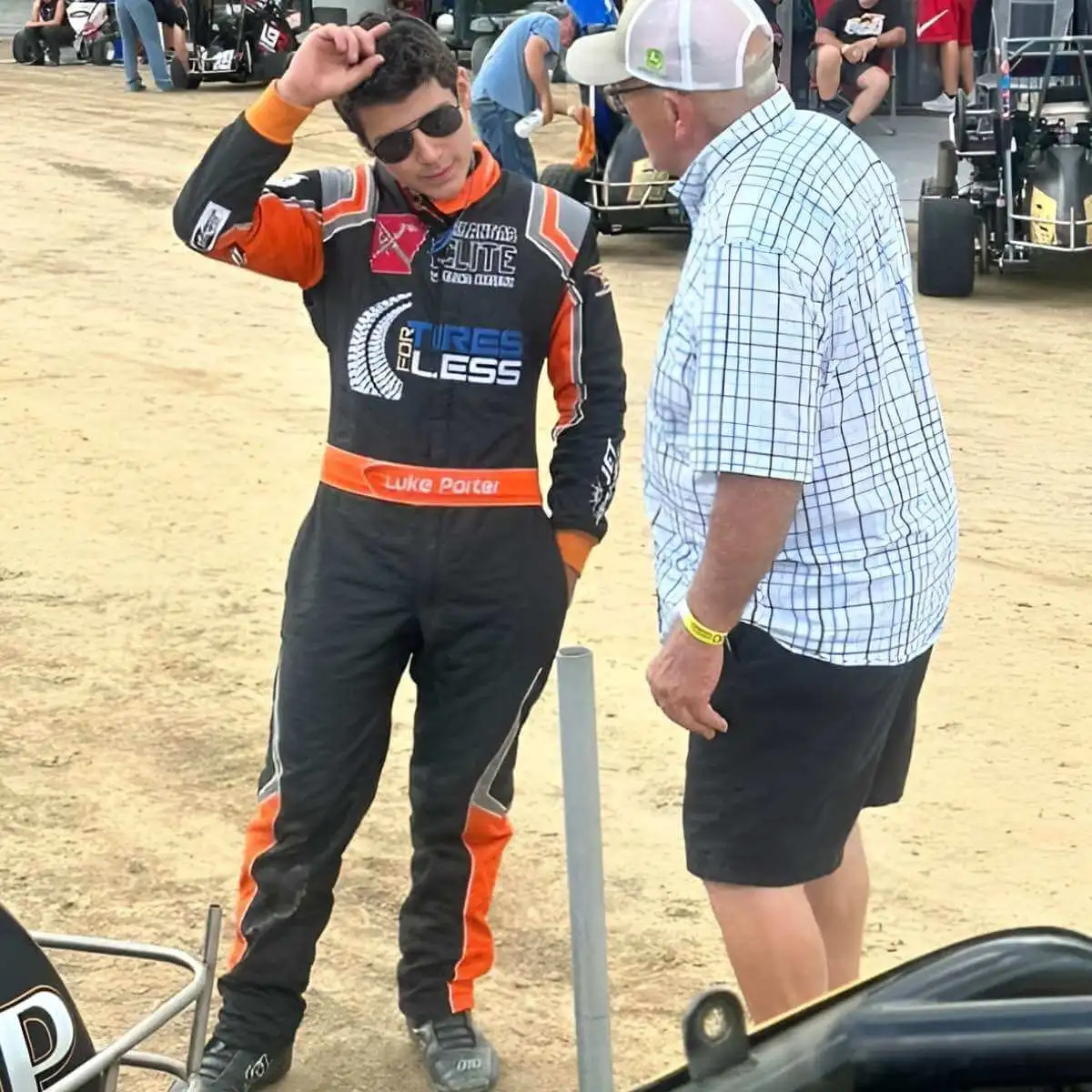 Driver wearing a FervoGear custom race suit