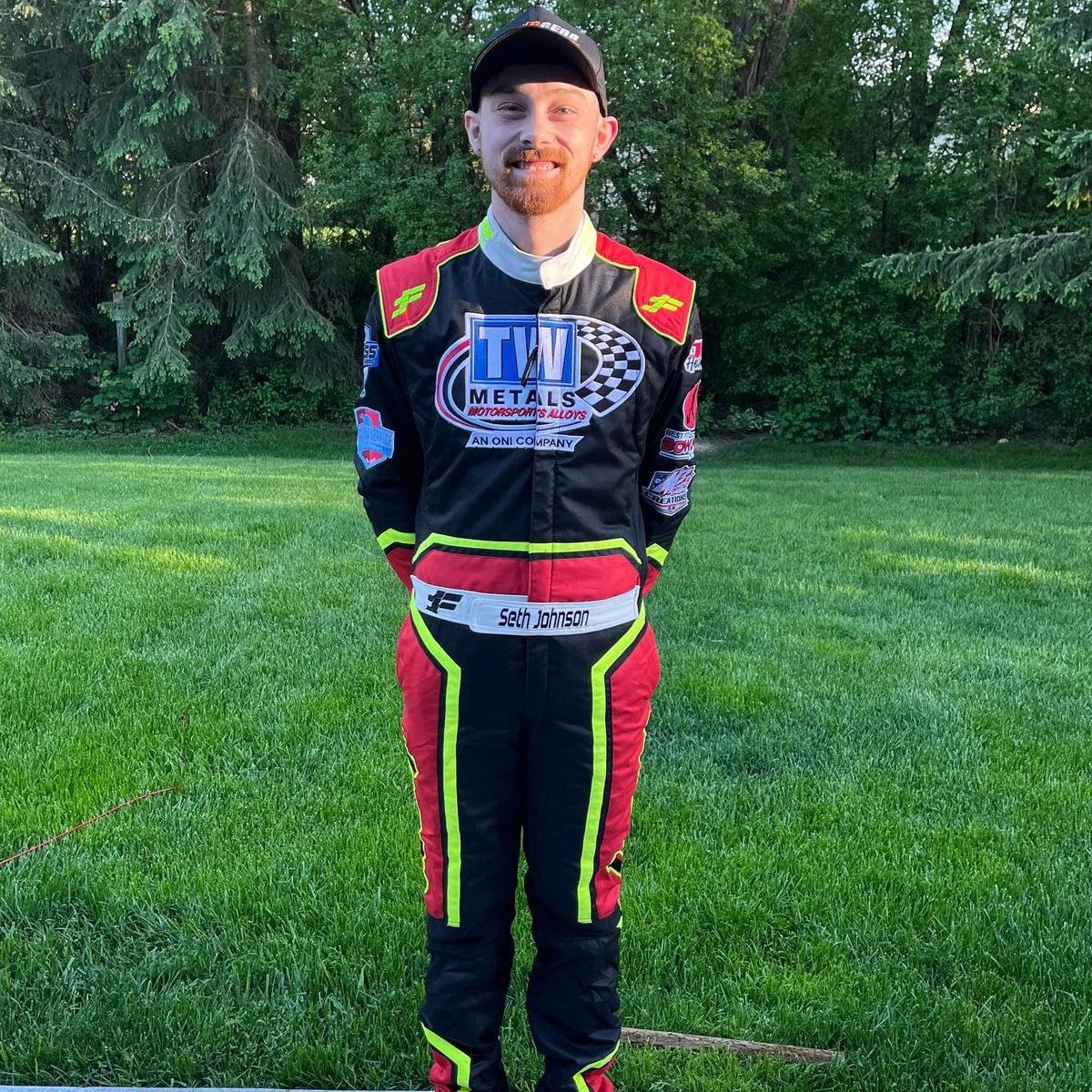 Driver wearing a FervoGear custom race suit