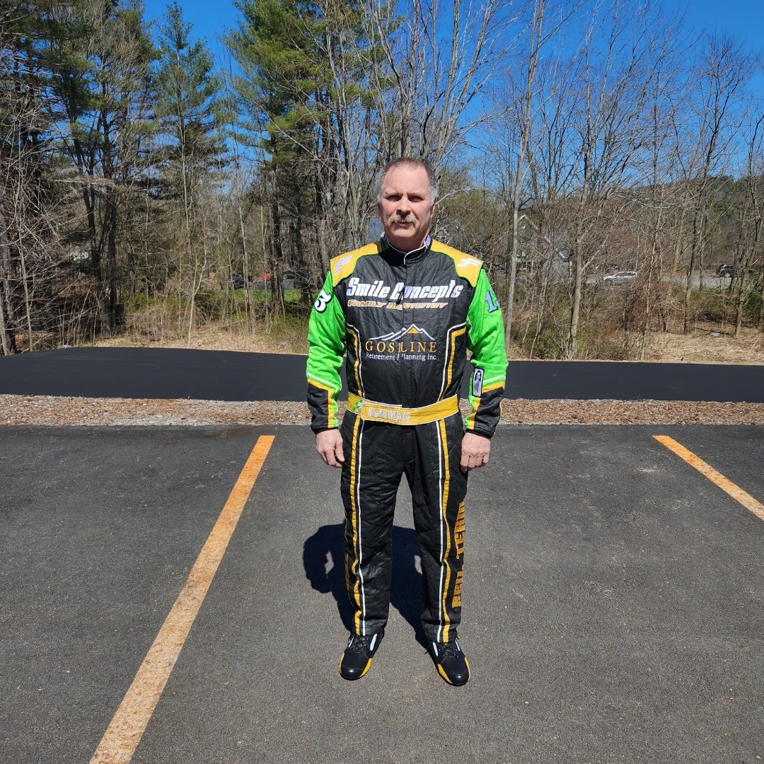 Racer in a full-color sublimated custom karting suit